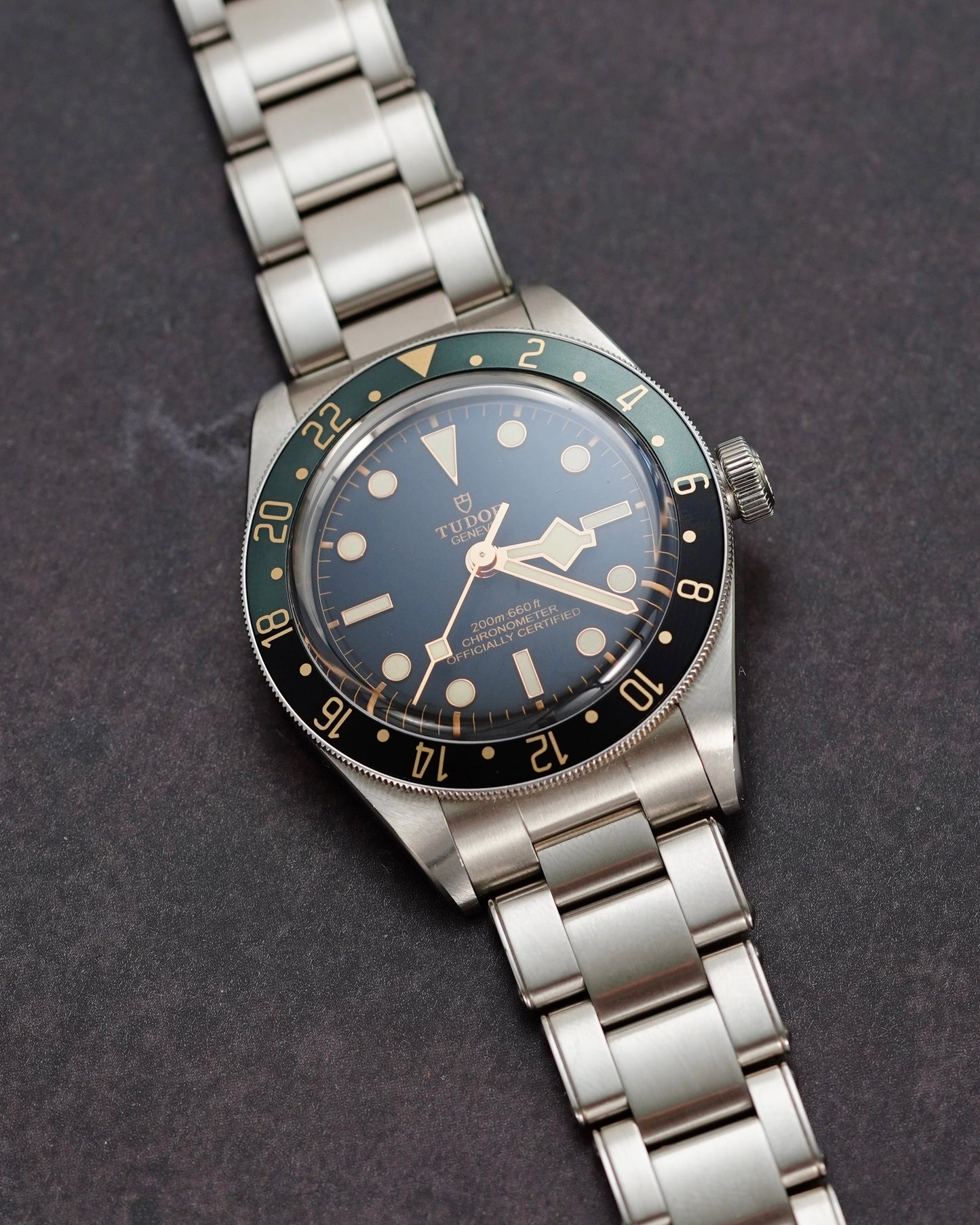 Vintage watch with a silver bracelet on a dark background